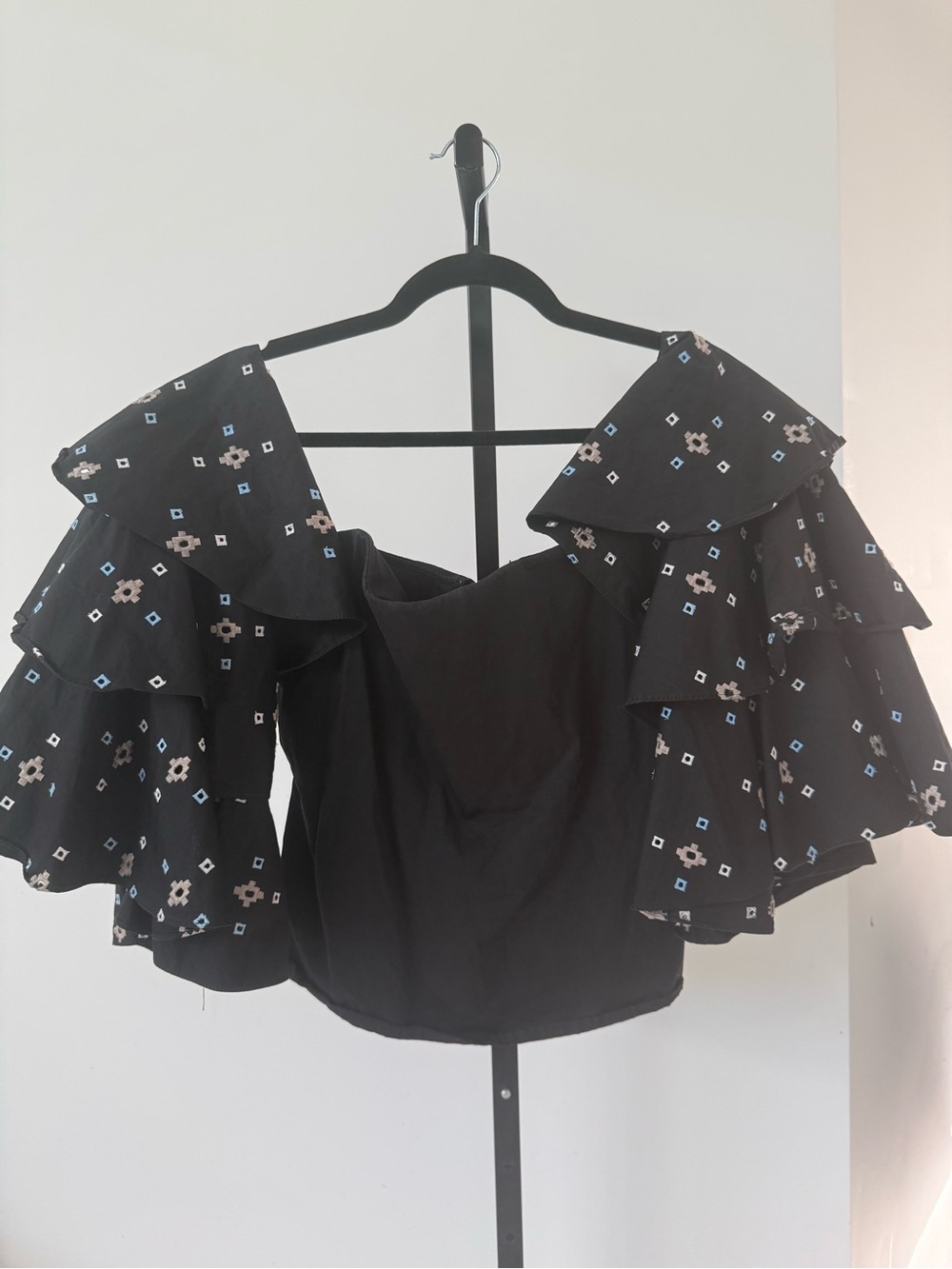 Caroline Constas Black Off-Shoulder Ruffle Sleeve Top with Floral Motif